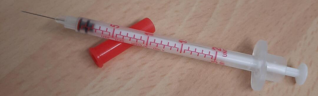 cat vaccination syringe